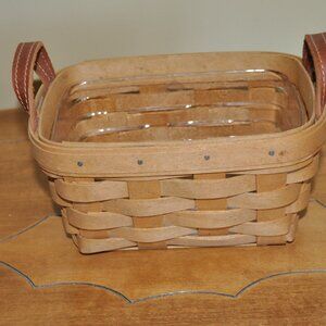 Longaberger tea basket with leather handles and protector